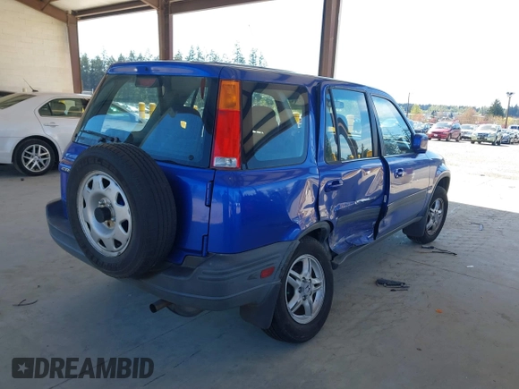 2001 Honda CR-V EX with VIN JHLRD18641C053166, listed as a IAAI auction lot 42078219 with 157,355 mi miles and . Bid and sale history available at DreamBid. Image 4.