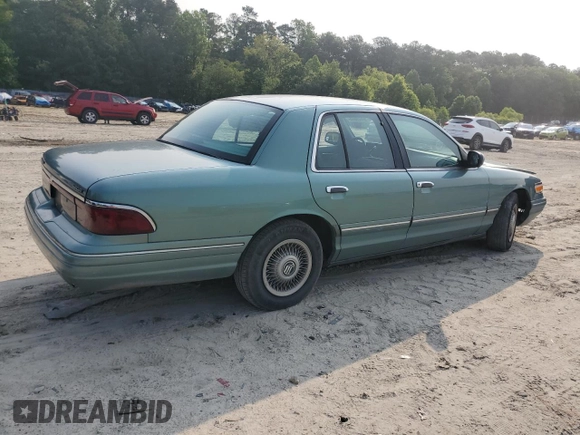 1997 Mercury Grand Marquis GS z VIN 2MELM74W2VX663313, wystawiony jako Copart lot #59539665 z przebiegiem 260 024 mil mil oraz Czysty tytuł • Clean title. Historia ofert i sprzedaży dostępna na DreamBid. Obrazek 3.