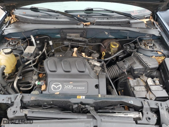2001 Mazda Tribute LX with VIN 4F2YU09101KM22133, listed as a Copart auction lot 84488134 with 212,157 mi miles and Salvage Title. Bid and sale history available at carsss.com. Image 12.