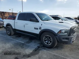 2018 Ram 1500 Rebel with VIN 1C6RR7YT7JS235965, listed as a Copart auction lot 64030615 with 61,485 mi miles and Salvage title. Bid and sale history available at DreamBid. Image 4.