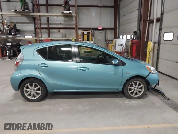 2014 Toyota Prius One z VIN JTDKDTB3XE1060360, wystawiony jako IAAI lot #41972531 z przebiegiem 140 012 mil mil oraz . Historia ofert i sprzedaży dostępna na DreamBid. Obrazek 13.