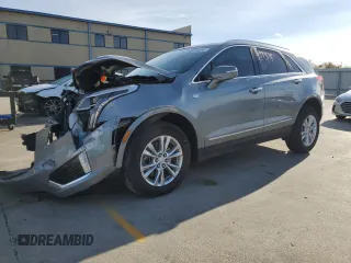 2023 Cadillac XT5 FWD Luxury z VIN 1GYKNAR49PZ174591, wystawiony jako Copart lot #82715414 z przebiegiem 20 005 mil mil oraz Szkoda całkowita • Salvage title. Historia ofert i sprzedaży dostępna na DreamBid. Obrazek 1.