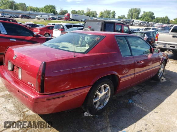 2000 Cadillac Eldorado Touring ETC z VIN 1G6ET129XYU191433, wystawiony jako Copart lot #58108224 z przebiegiem 76 957 mil mil oraz Szkody całkowita. Historia ofert i sprzedaży dostępna na DreamBid. Obrazek 3.