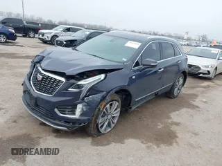 2024 Cadillac XT5 FWD Premium Luxury with VIN 1GYKNCR47RZ755652, listed as a IAAI auction lot 41512069 with 10,243 mi miles. Bid and sale history available at carsss.com. Image 17.