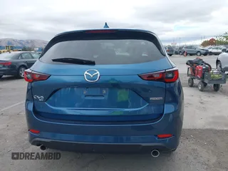 2024 Mazda CX-5 S Carbon Edition z VIN JM3KFBCL2R0454425, wystawiony jako IAAI lot #40934280 z przebiegiem 4 094 mil mil oraz . Historia ofert i sprzedaży dostępna na DreamBid. Obrazek 17.
