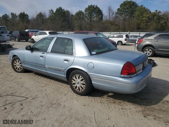 2005 Ford Crown Victoria LX with VIN 2FAFP74W65X168866, listed as a Copart auction lot 47220335 with 163,973 mi miles and Salvage Title. Bid and sale history available at carsss.com. Image 2.