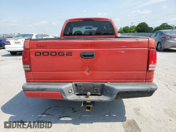 1999 Dodge Dakota SLT z VIN 1B7GL22X6XS243645, wystawiony jako Copart lot #54258675 z przebiegiem 114 362 mil mil oraz Czysty tytuł • Clean title. Historia ofert i sprzedaży dostępna na DreamBid. Obrazek 6.
