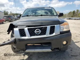 2015 Nissan Titan Pro-4X with VIN 1N6BA0EC1FN507491, listed as a Copart auction lot 51240915 with 165,510 mi miles and Salvage title. Bid and sale history available at DreamBid. Image 5.