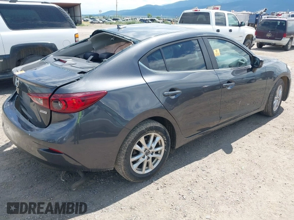 2016 Mazda 3 i Grand Touring with VIN JM1BM1X72G1277453, listed as a IAAI auction lot 42587758 with Not provided miles and . Bid and sale history available at DreamBid. Image 4.