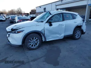 2023 Mazda CX-5 2.5 S with VIN JM3KFBAM6P0269481, listed as a Copart auction lot 87222194 with 21,070 mi miles and Salvage Title. Bid and sale history available at carsss.com. Image 1.