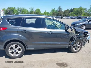 2016 Ford Escape SE z VIN 1FMCU9GX1GUB92472, wystawiony jako IAAI lot #42133744 z przebiegiem 184 000 mil mil oraz . Historia ofert i sprzedaży dostępna na DreamBid. Obrazek 12.