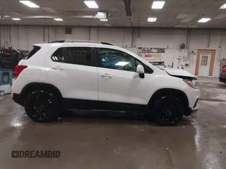 2022 Chevrolet Trax LT z VIN KL7CJPSM0NB537074, wystawiony jako IAAI lot #41843390 z przebiegiem 74 100 mil mil oraz . Historia ofert i sprzedaży dostępna na DreamBid. Obrazek 13.