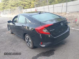 2016 Honda Civic Sedan EX-L with VIN 19XFC1F71GE209163, listed as a IAAI auction lot 40322953 with 149,874 mi miles. Bid and sale history available at carsss.com. Image 3.