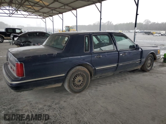 1995 Lincoln Town Car Signature z VIN 1LNLM82W0SY744473, wystawiony jako Copart lot #44752735 z przebiegiem Nie podano mil oraz Szkoda całkowita • Salvage title. Historia ofert i sprzedaży dostępna na DreamBid. Obrazek 3.