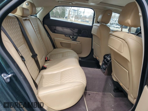 2016 Jaguar XJ Portfolio z VIN SAJWJ2GD0G8V92850, wystawiony jako Copart lot #47844065 z przebiegiem 99 652 mil mil oraz Szkoda całkowita • Salvage title. Historia ofert i sprzedaży dostępna na DreamBid. Obrazek 10.