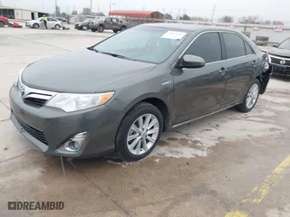 2014 Toyota Camry Hybrid LE with VIN 4T1BD1FK8EU102685, listed as a IAAI auction lot 41469306 with 91,606 mi miles. Bid and sale history available at carsss.com. Image 2.