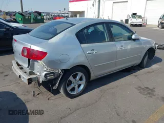 2006 Mazda Mazda3 i with VIN JM1BK12G861534885, listed as a IAAI auction lot 39860656 with 203,722 mi miles. Bid and sale history available at carsss.com. Image 4.