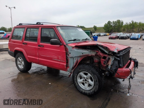 1999 Jeep Cherokee Sport with VIN 1J4FF68S2XL648735, listed as a Copart auction lot 58758115 with 252,248 mi miles and Salvage title. Bid and sale history available at DreamBid. Image 4.