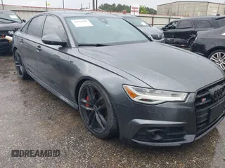2017 Audi S6 Premium Plus z VIN WAUFFAFC6HN088418, wystawiony jako IAAI lot #42514342 z przebiegiem 76 580 mil mil oraz . Historia ofert i sprzedaży dostępna na DreamBid. Obrazek 1.