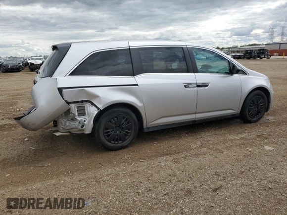 2014 Honda Odyssey LX z VIN 5FNRL5H21EB106600, wystawiony jako Copart lot #57875765 z przebiegiem 122 159 mil mil oraz Szkoda całkowita • Salvage title. Historia ofert i sprzedaży dostępna na DreamBid. Obrazek 3.