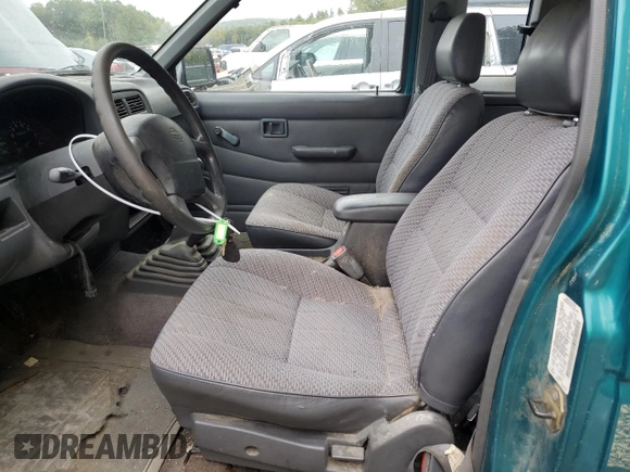 1997 Nissan Frontier XE with VIN 1N6SD16Y0VC329686, listed as a Copart auction lot 73103584 with 105,657 mi miles and Salvage title. Bid and sale history available at DreamBid. Image 7.