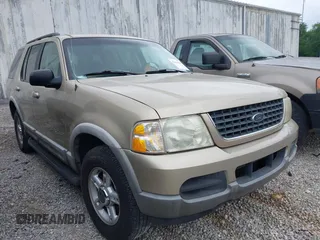 2002 Ford Explorer XLT z VIN 1FMZU73E42UC28196, wystawiony jako IAAI lot #42136562 z przebiegiem 216 520 mil mil oraz . Historia ofert i sprzedaży dostępna na DreamBid. Obrazek 1.