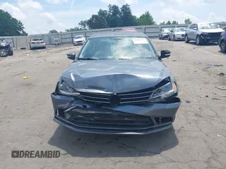 2014 Volkswagen Jetta SE with VIN 3VWD07AJ3EM232529, listed as a IAAI auction lot 42286442 with 125,000 mi miles and . Bid and sale history available at DreamBid. Image 12.