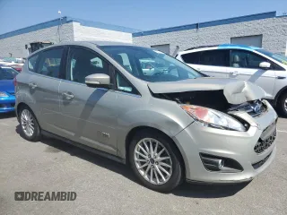 2015 Ford C-Max Energi SEL with VIN 1FADP5CU9FL115704, listed as a Copart auction lot 73208404 with 130,343 mi miles and Salvage Title. Bid and sale history available at carsss.com. Image 4.