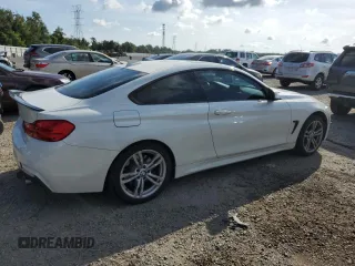 2014 BMW 4 Series 435i xDrive with VIN WBA3R5C59EK187836, listed as a Copart auction lot 63946075 with 100,700 mi miles and Salvage title. Bid and sale history available at DreamBid. Image 3.
