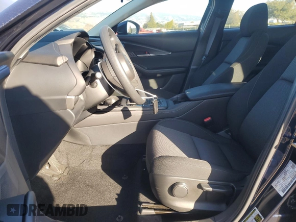2025 Mazda CX-30 S with VIN 3MVDMBAM5SM751984, listed as a Copart auction lot 43232255 with 2,448 mi miles and Salvage title. Bid and sale history available at DreamBid. Image 7.