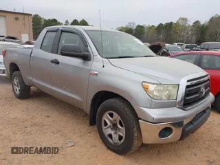 2012 Toyota Tundra z VIN 5TFRY5F10CX129770, wystawiony jako IAAI lot #41889226 z przebiegiem 144 171 mil mil oraz . Historia ofert i sprzedaży dostępna na DreamBid. Obrazek 1.