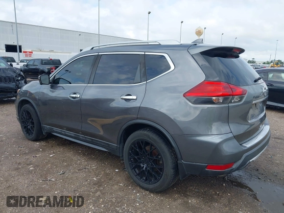 2017 Nissan Rogue SL with VIN 5N1AT2MT1HC741405, listed as a IAAI auction lot 42086933 with 153,918 mi miles and . Bid and sale history available at DreamBid. Image 3.
