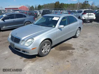 2005 Mercedes-Benz E-Class 3.2L with VIN WDBUF65J15A669561, listed as a IAAI auction lot 41888887 with 87,317 mi miles. Bid and sale history available at carsss.com. Image 2.