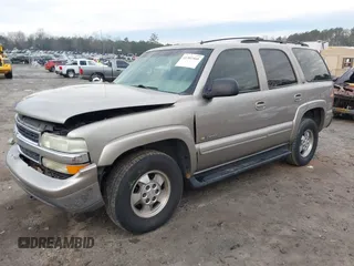 2002 Chevrolet Tahoe LT with VIN 1GNEC13Z22J256805, listed as a IAAI auction lot 41302460 with 249,578 mi miles and . Bid and sale history available at DreamBid. Image 2.