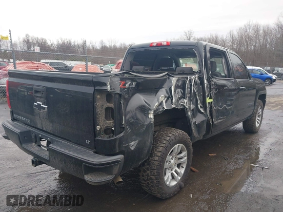 2018 Chevrolet Silverado 1500 LT with VIN 3GCUKREC5JG460979, listed as a IAAI auction lot 41741667 with 122,931 mi miles. Bid and sale history available at carsss.com. Image 4.