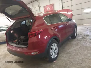 2018 Kia Sportage LX with VIN KNDPM3AC4J7449705, listed as a IAAI auction lot 41640305 with 74,292 mi miles and . Bid and sale history available at carsss.com. Image 4.