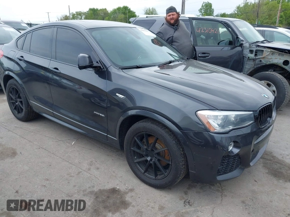 2015 BMW X4 xDrive28i with VIN 5UXXW3C54F0M88740, listed as a IAAI auction lot 42275157 with 159,281 mi miles and . Bid and sale history available at DreamBid. Image 1.