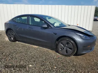 2023 Tesla Model 3 with VIN 5YJ3E1EA4PF613160, listed as a Copart auction lot 62008045 with 23,575 mi miles and Clean title. Bid and sale history available at DreamBid. Image 4.