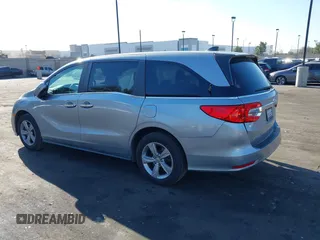 2018 Honda Odyssey EX-L with VIN 5FNRL6H71JB089289, listed as a IAAI auction lot 41813322 with 94,933 mi miles and . Bid and sale history available at DreamBid. Image 15.