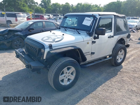 2012 Jeep Wrangler Sport z VIN 1C4AJWAG9CL255278, wystawiony jako IAAI lot #42469091 z przebiegiem 140 480 mil mil oraz . Historia ofert i sprzedaży dostępna na DreamBid. Obrazek 18.
