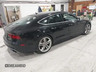 2016 Audi S7 with VIN WAUW2AFC5GN010917, listed as a IAAI auction lot 41785569 with 33,761 mi miles. Bid and sale history available at carsss.com. Image 4.