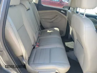 2015 Ford Escape Titanium with VIN 1FMCU9J92FUC74879, listed as a Copart auction lot 54683185 with 143,436 mi miles and Salvage title. Bid and sale history available at DreamBid. Image 11.