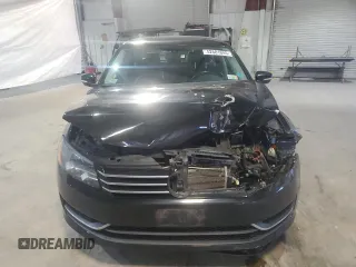 2014 Volkswagen Passat Wolfsburg Edition z VIN 1VWAT7A36EC081263, wystawiony jako Copart lot #52681045 z przebiegiem 114 333 mil mil oraz Czysty tytuł • Clean title. Historia ofert i sprzedaży dostępna na DreamBid. Obrazek 5.