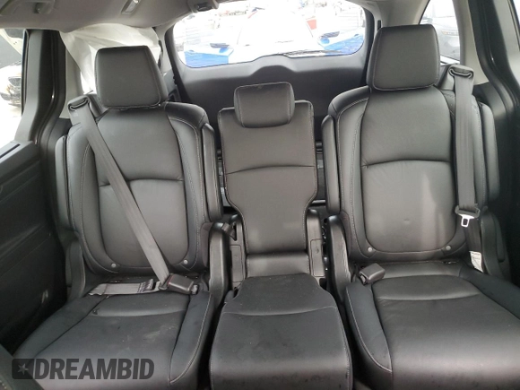 2024 Honda Odyssey Touring z VIN 5FNRL6H85RB016317, wystawiony jako Copart lot #59483565 z przebiegiem 17 351 mil mil oraz Nie do naprawy • Non repairable. Historia ofert i sprzedaży dostępna na DreamBid. Obrazek 10.