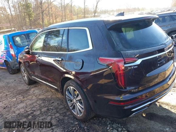 2021 Cadillac XT6 Premium Luxury with VIN 1GYKPDRS7MZ133561, listed as a IAAI auction lot 41112365 with 73,956 mi miles. Bid and sale history available at carsss.com. Image 3.