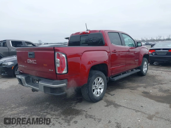 2018 GMC Canyon 2WD SLE with VIN 1GTG5CEN5J1285392, listed as a IAAI auction lot 41596516 with 73,885 mi miles. Bid and sale history available at carsss.com. Image 4.