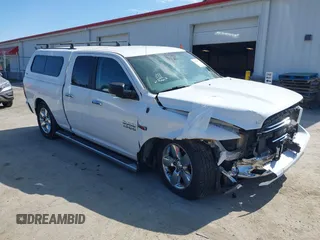2015 Ram 1500 Outdoorsman z VIN 1C6RR7GM1FS670336, wystawiony jako IAAI lot #41799373 z przebiegiem 127 917 mil mil oraz . Historia ofert i sprzedaży dostępna na DreamBid. Obrazek 1.