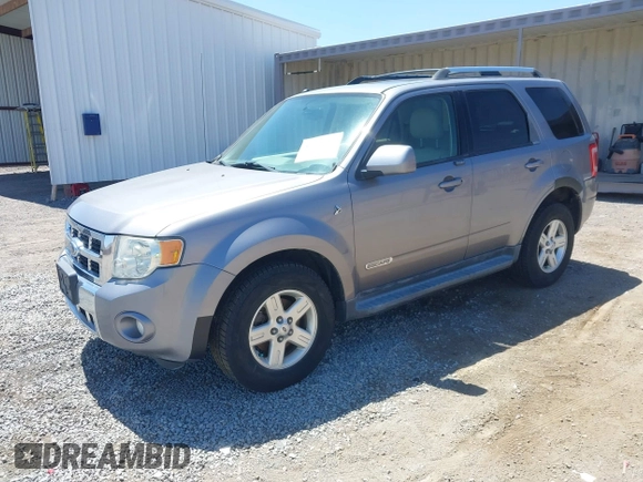 2008 Ford Escape Hybrid with VIN 1FMCU59H28KB77877, listed as a IAAI auction lot 42538747 with 305,353 mi miles and . Bid and sale history available at DreamBid. Image 2.