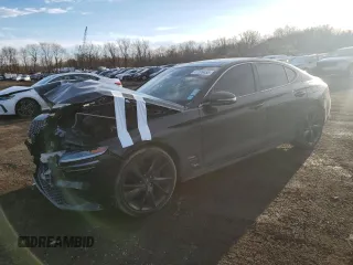 2023 Genesis G70 2.0T z VIN KMTG34TA6PU112825, wystawiony jako Copart lot #47099455 z przebiegiem 77 637 mil mil oraz Szkoda całkowita • Salvage title. Historia ofert i sprzedaży dostępna na DreamBid. Obrazek 1.