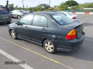 2003 Suzuki Aerio S z VIN JS2RA41S135158128, wystawiony jako IAAI lot #41425178 z przebiegiem 166 019 mil mil oraz . Historia ofert i sprzedaży dostępna na DreamBid. Obrazek 3.